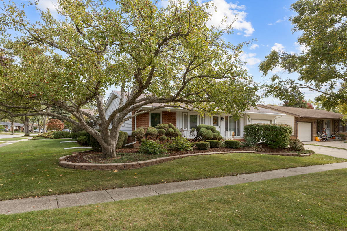 851 Crest Avenue Elk Grove Village, IL 60007 - Photo 2 of 25 a front view of a house with a yard