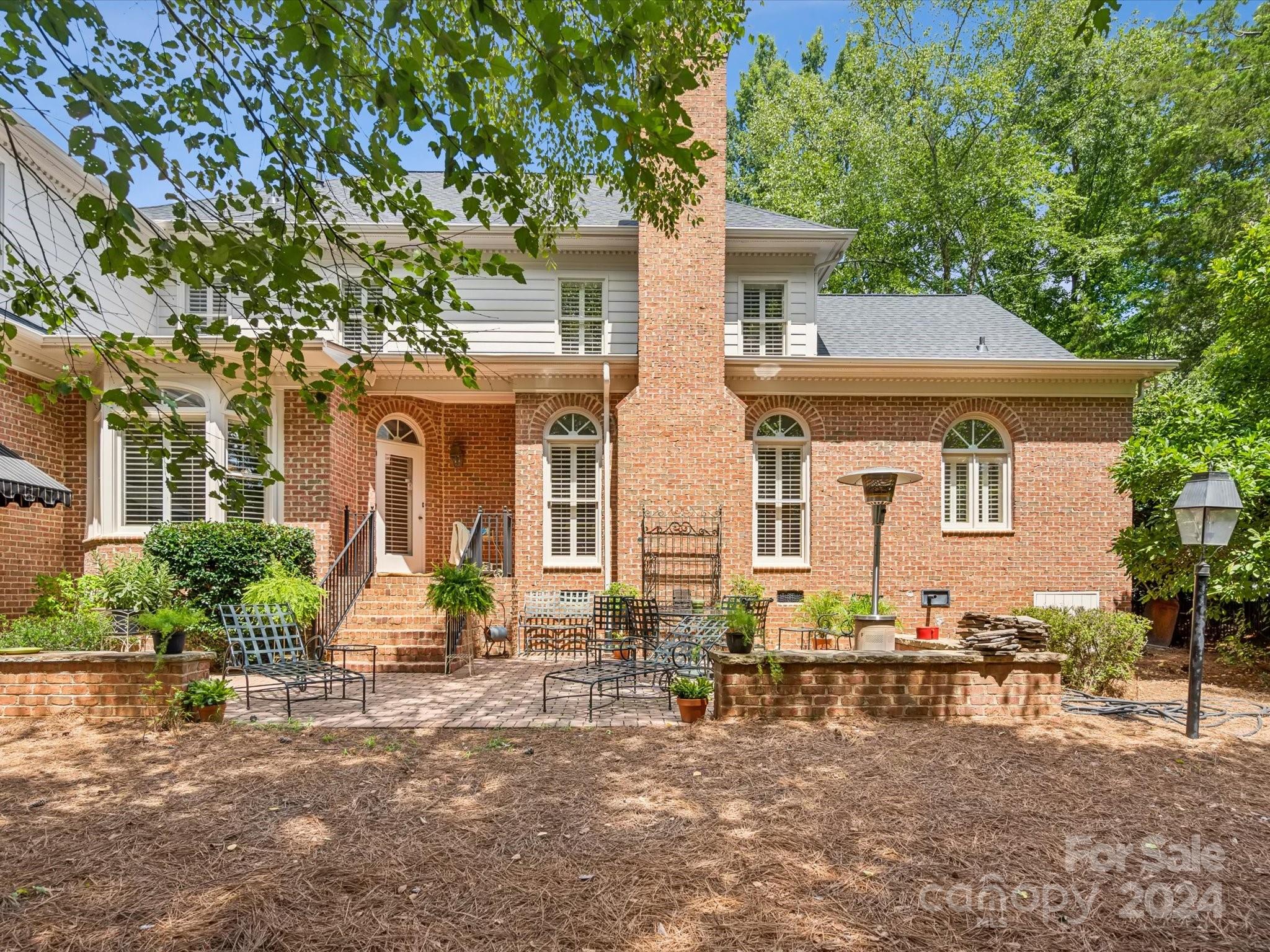 1101 Sydney Drive Charlotte, NC 28270 - Photo 31 of 46 a front view of a house with garden
