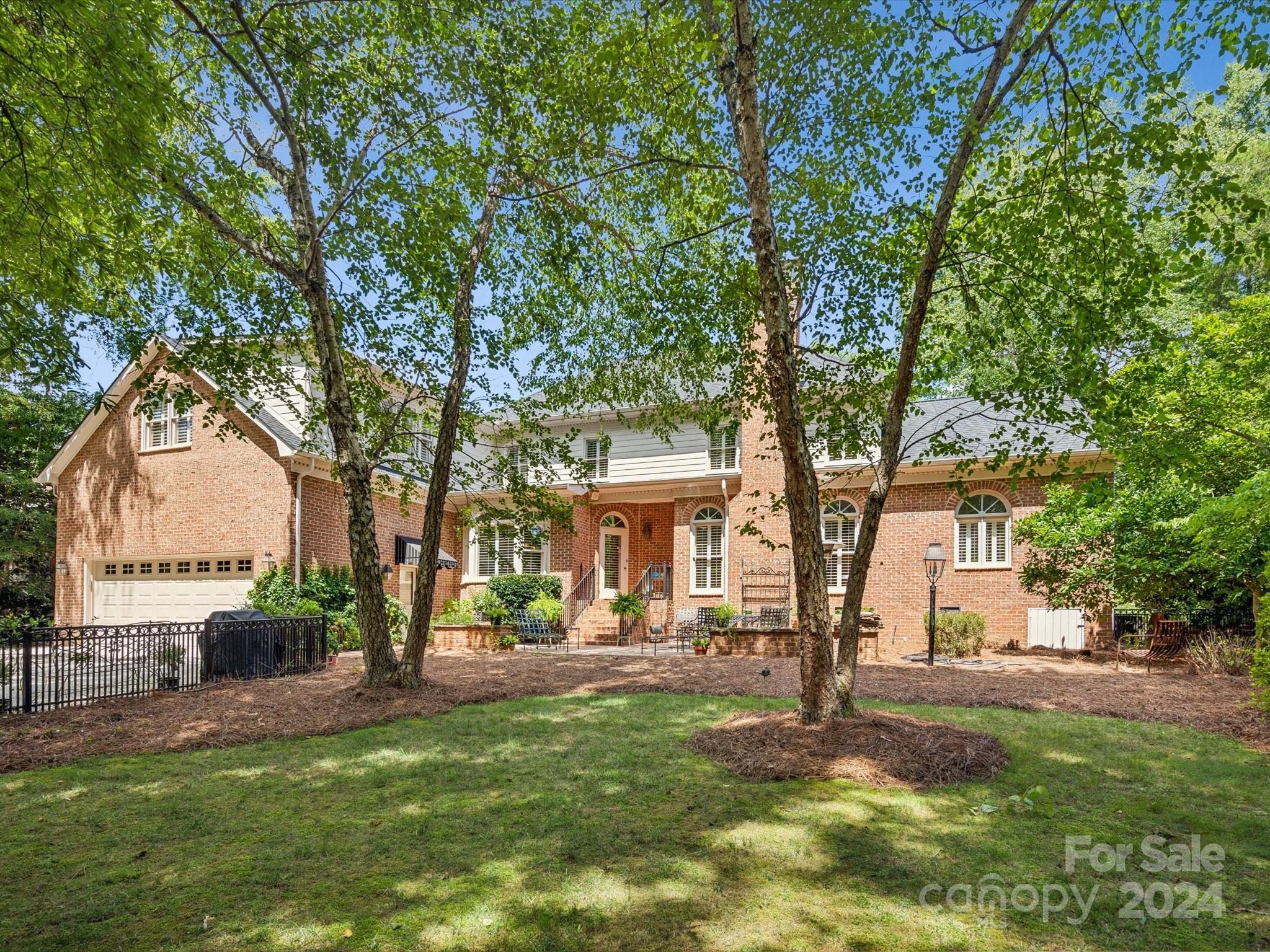 1101 Sydney Drive Charlotte, NC 28270 - Photo 35 of 46 a view of a house with backyard and a tree