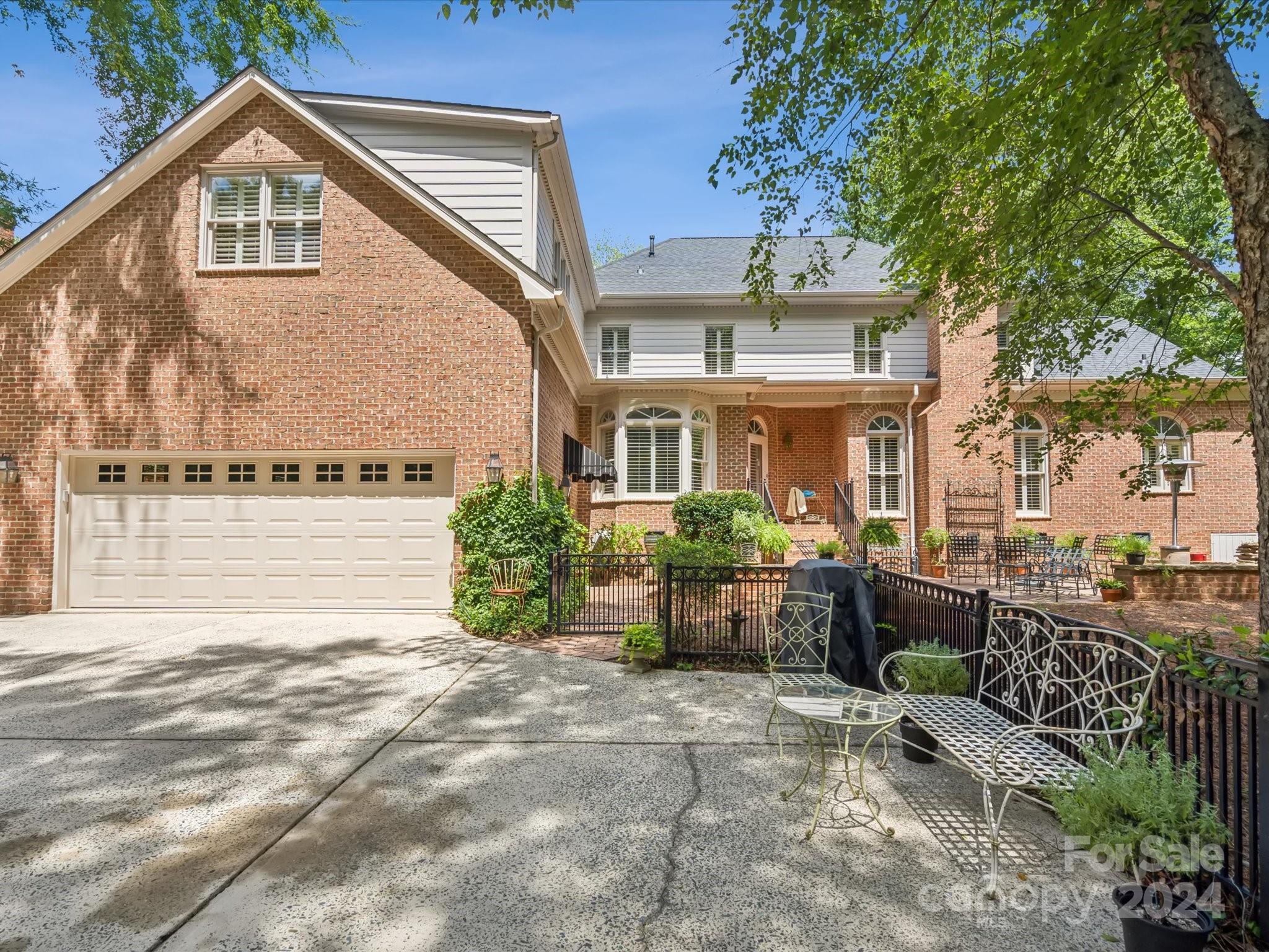 1101 Sydney Drive Charlotte, NC 28270 - Photo 36 of 46 a front view of a house with garden