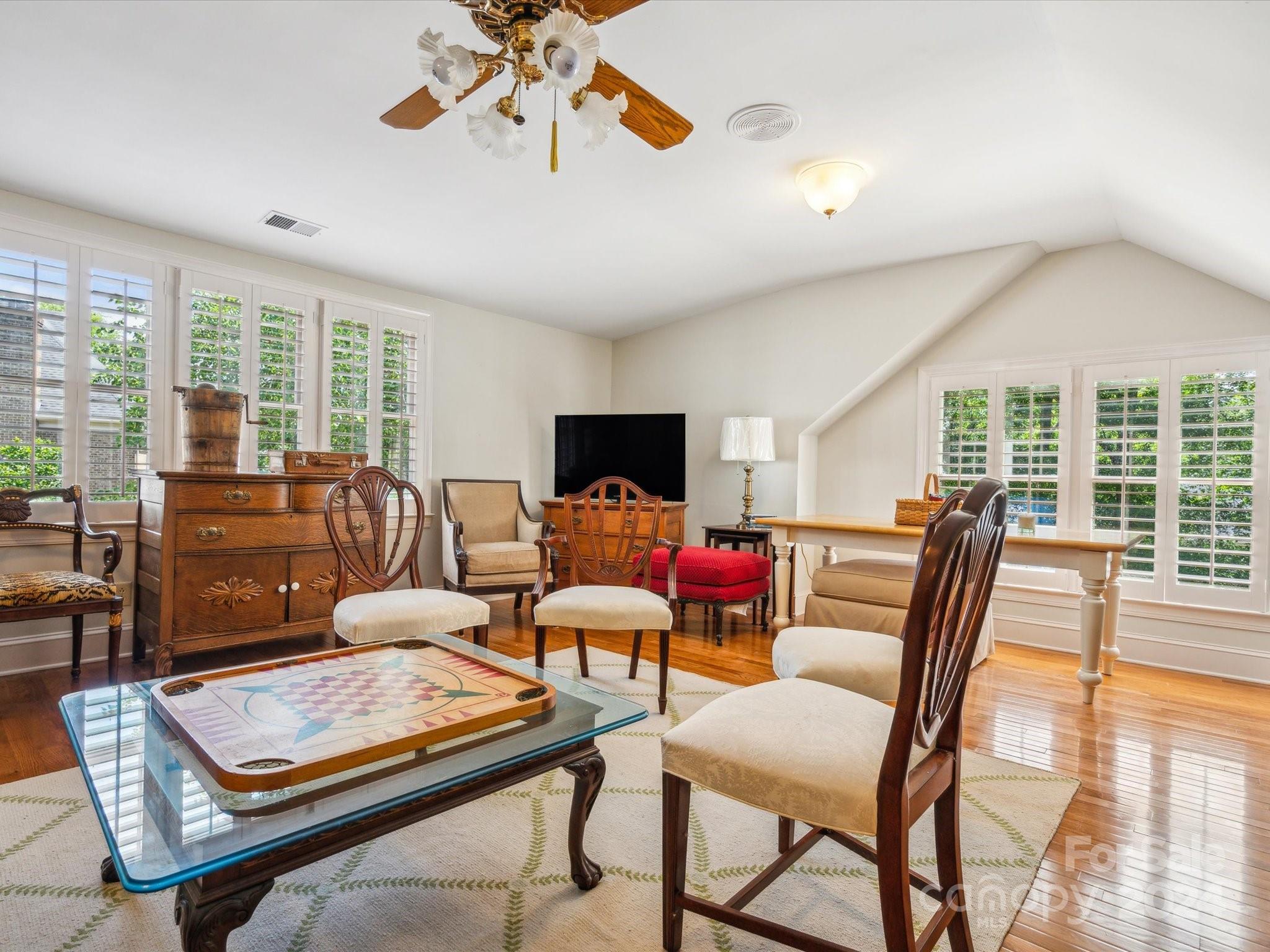 1101 Sydney Drive Charlotte, NC 28270 - Photo 45 of 46 a living room with furniture and a flat screen tv