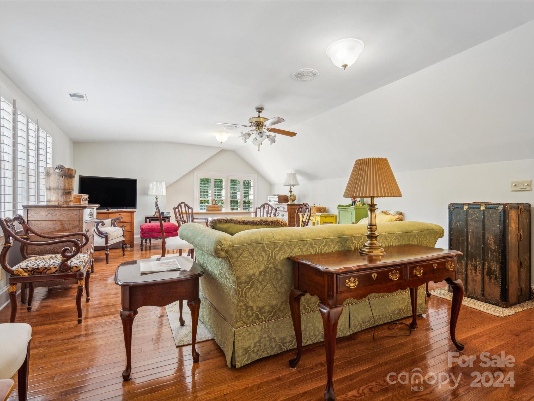 1101 Sydney Drive Charlotte, NC 28270 - Photo 46 of 46 a living room with furniture and a flat screen tv