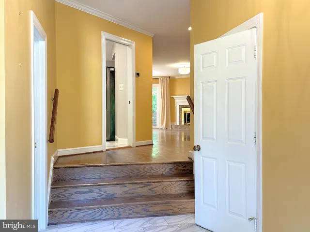 view of hall with wooden floor