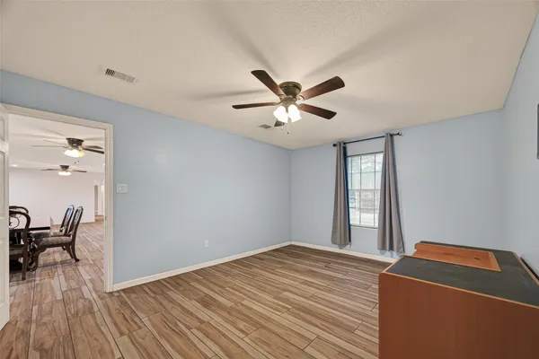 a room with bed and a window