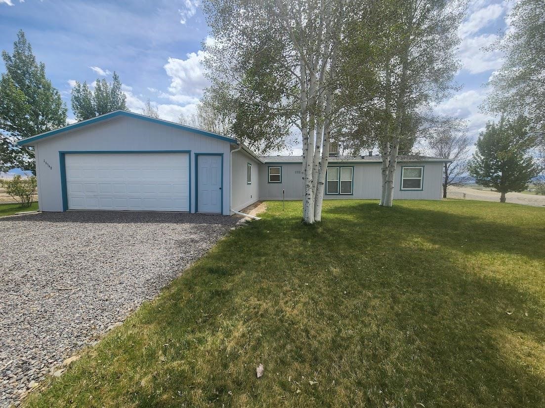 19548 B50 Road Delta, CO 81416 - Photo 2 of 37 a front view of house with yard and trees