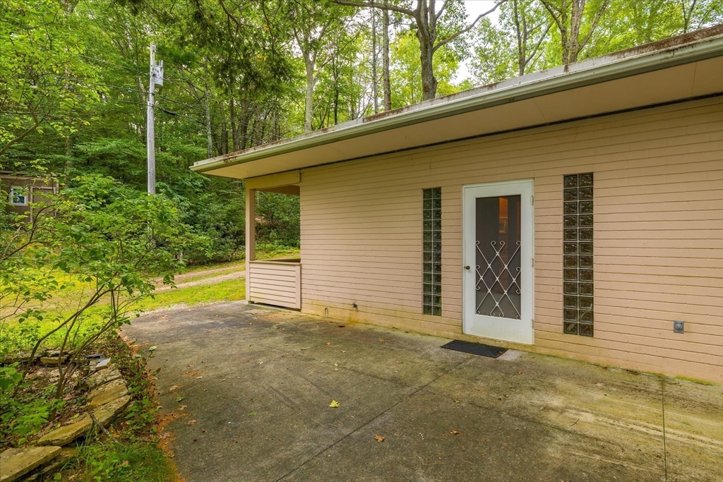 1 Cormack Road Sturbridge, MA 01566 - Photo 27 of 28 a view of a house with a backyard