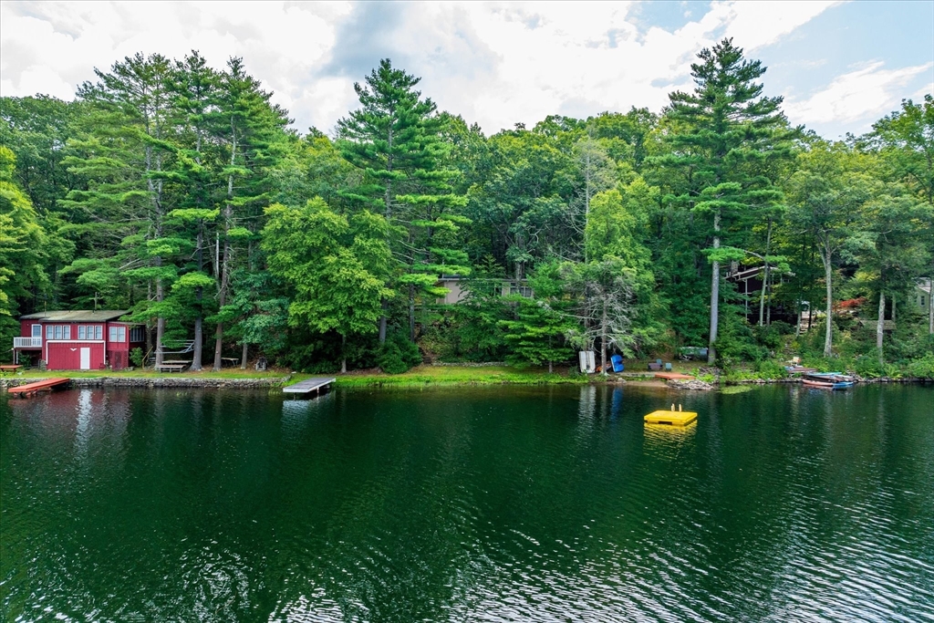 1 Cormack Road Sturbridge, MA 01566 - Photo 5 of 28 a view of back yard with green space and seating area