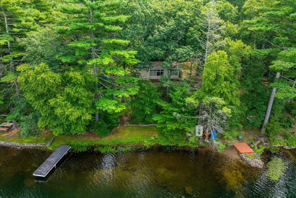 1 Cormack Road Sturbridge, MA 01566 - Photo 8 of 28 a view of a lake with a yard