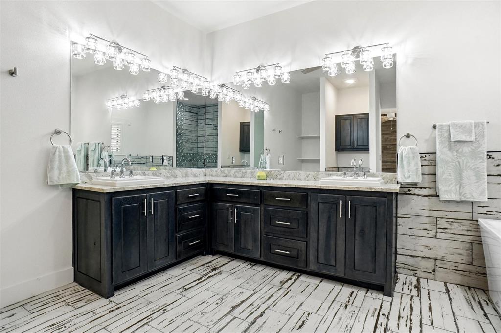 13240 Briar Road Azle, TX 76020 - Photo 15 of 39 a bathroom with a double vanity sink and a mirror