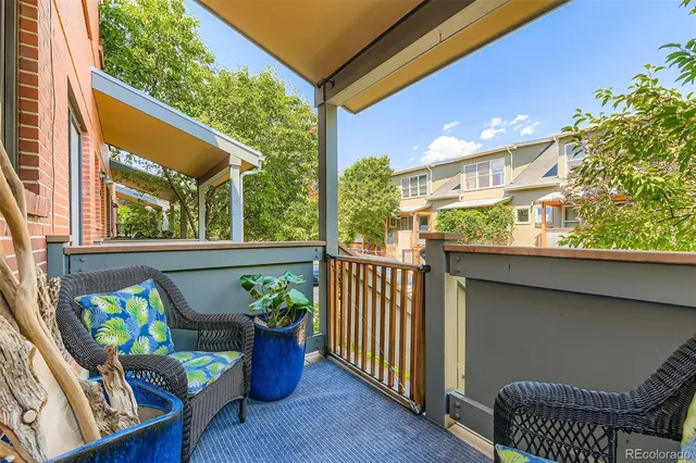 a view of a porch with furniture