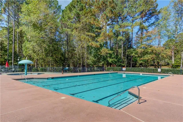 a view of yard with basketball court