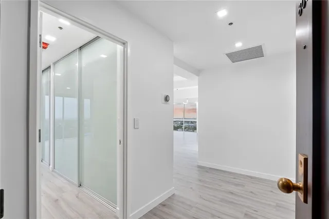 a close view of a utility room with dryer and washer