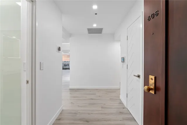 a bathroom with a double vanity sink and mirror