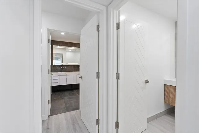 a bathroom with a bathtub and shower