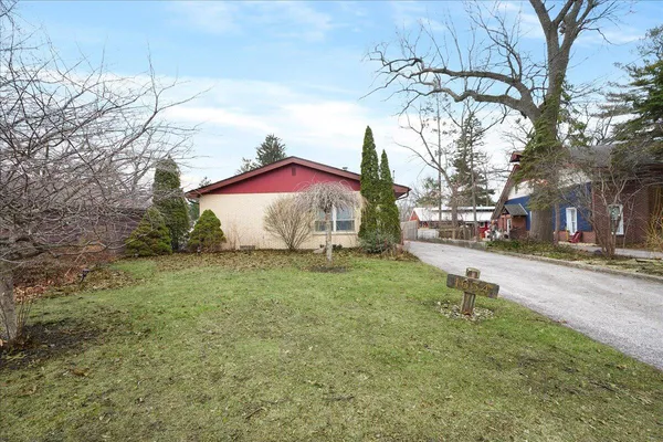 a house with trees in the background