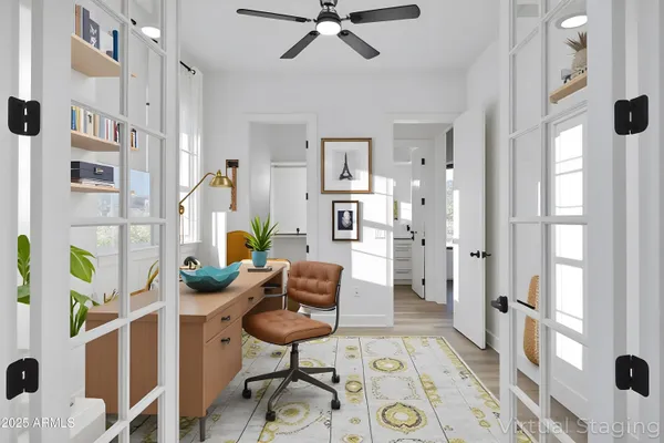 a bedroom with furniture and a window