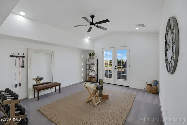 a bathroom with a sink a toilet a mirror and shower