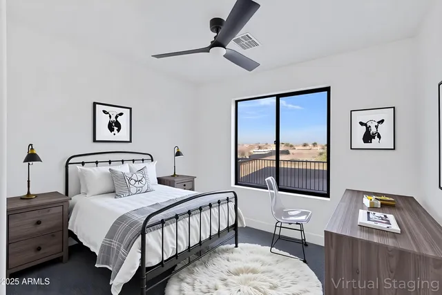 a bedroom with furniture and a window