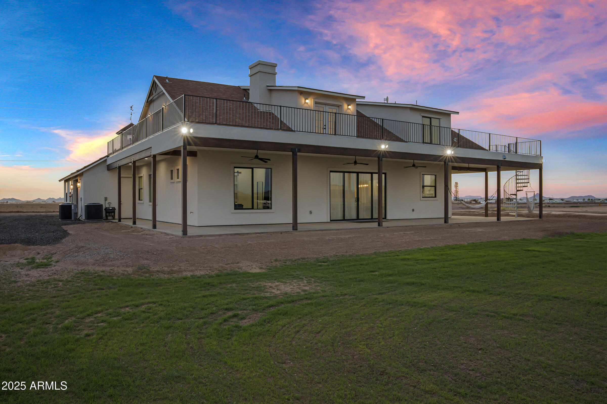 235 North Clemans Road Coolidge, AZ 85128 - Photo 28 of 33 a front view of a house with a garden