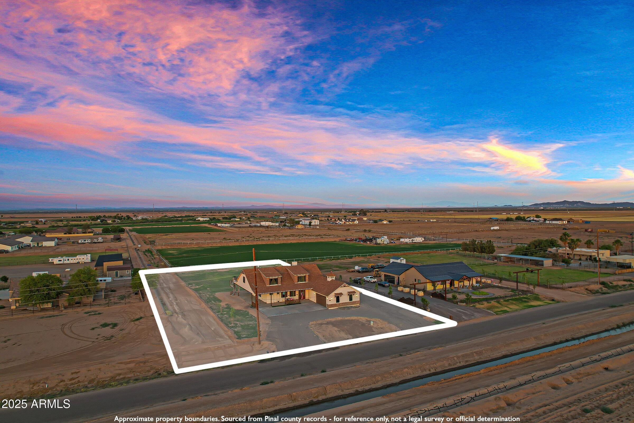 235 North Clemans Road Coolidge, AZ 85128 - Photo 2 of 33 a view of a city from a terrace