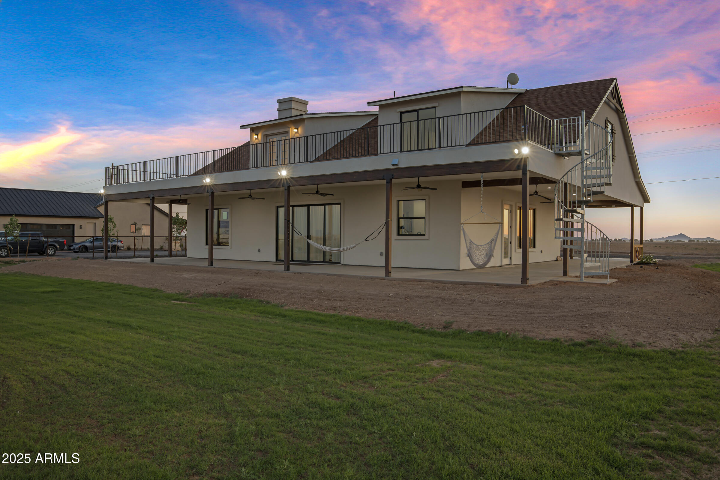 235 North Clemans Road Coolidge, AZ 85128 - Photo 29 of 33 a front view of a house with a garden