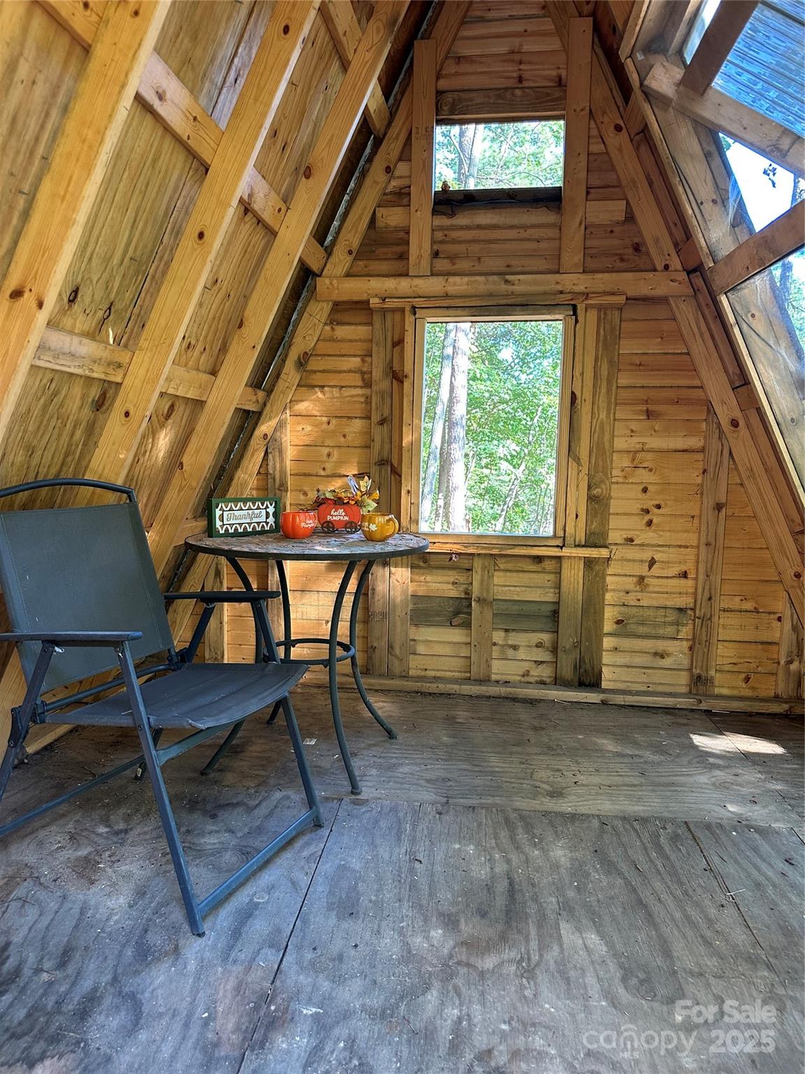 0 Wildlife Lake Road Old Fort, NC 28762 - Photo 11 of 21 a view of a porch with furniture and a grill