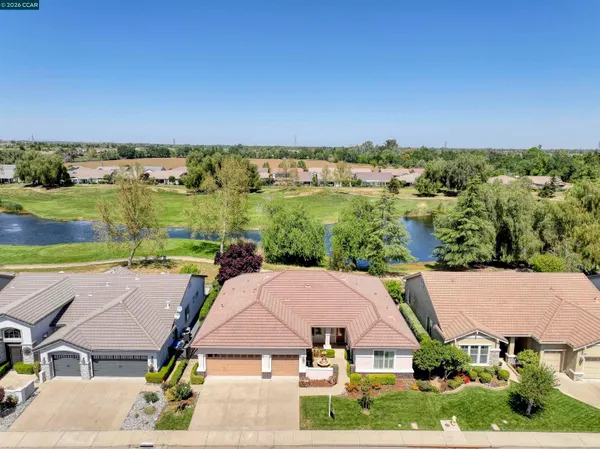 an aerial view of a house with garden space and outdoor space