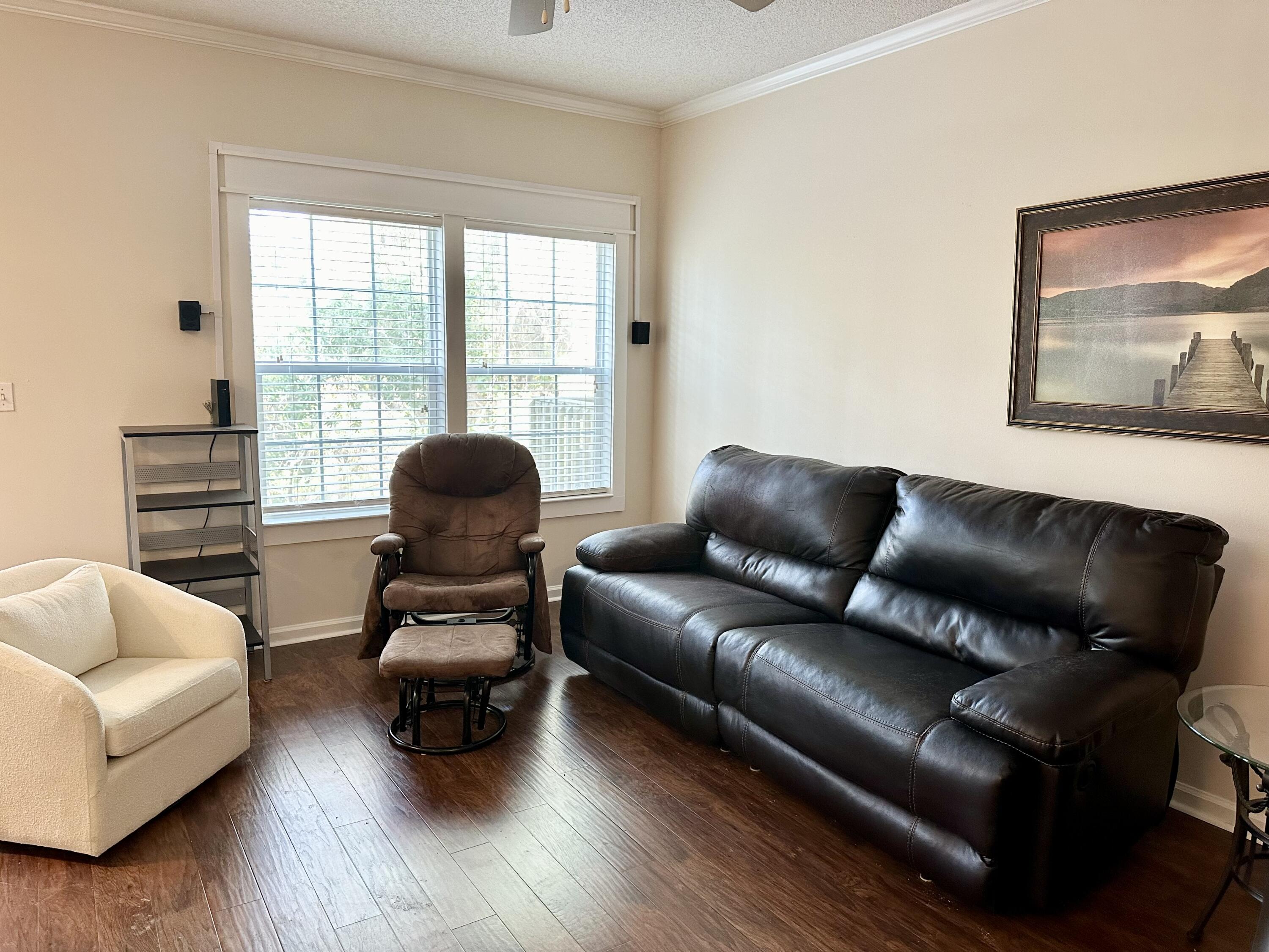 732 East Mack Bayou Drive, Unit 2 Santa Rosa Beach, FL 32459 - Photo 7 of 43 a living room with furniture and a large window