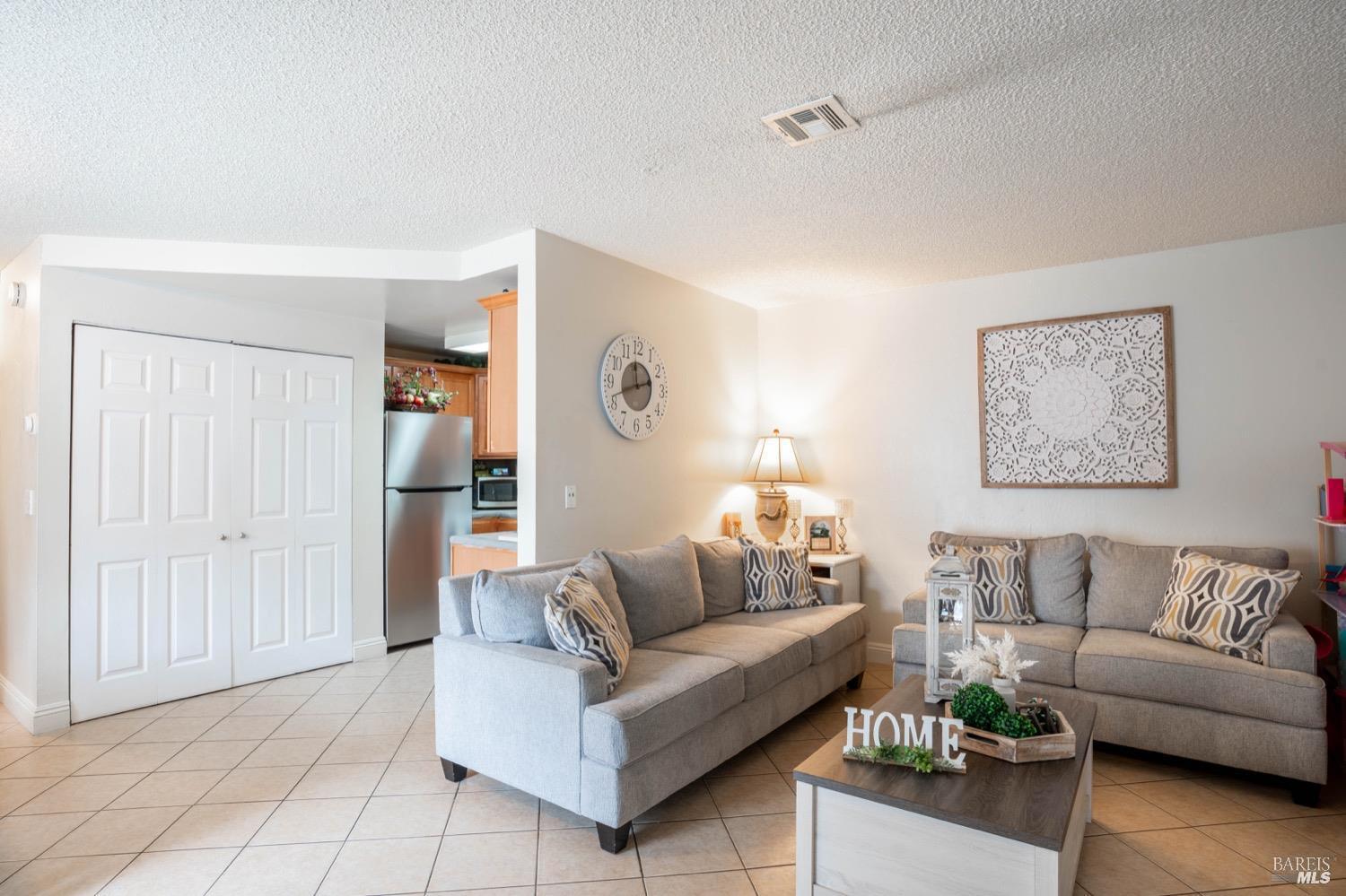 237 Del Loma Court Fairfield, CA 94533 - Photo 4 of 15 a living room with furniture and a couch