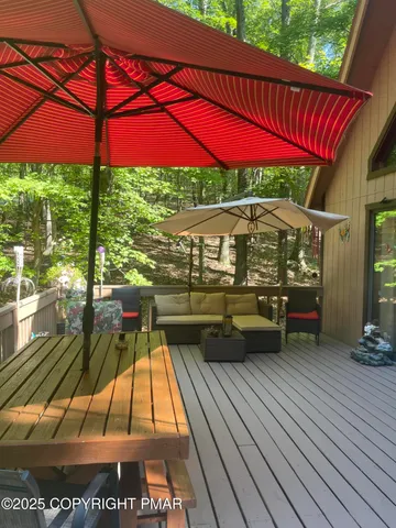 a view of swimming pool with a patio
