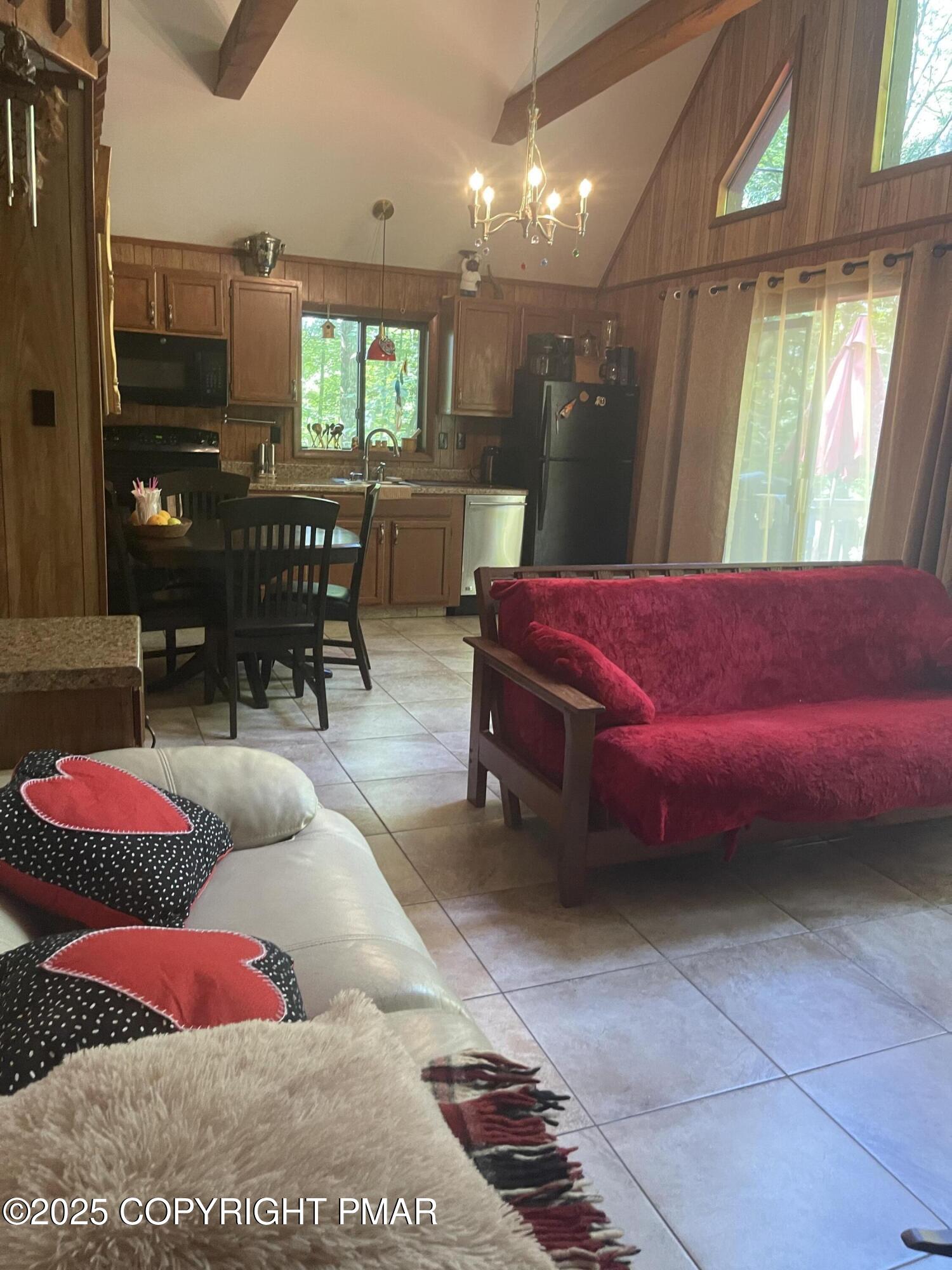 2112 Eagle Path Bushkill, PA 18324 - Photo 2 of 14 a living room with furniture and a large window