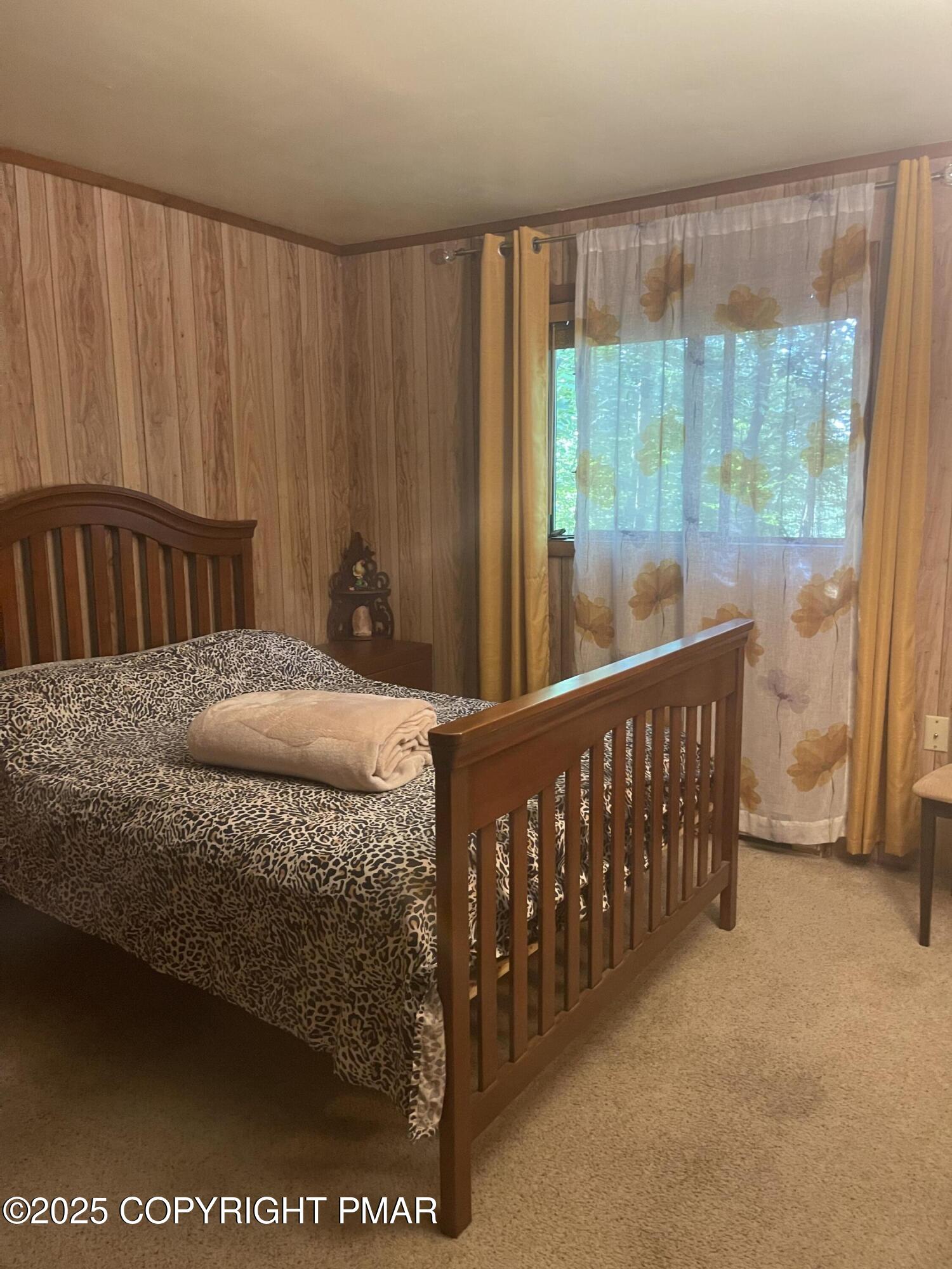 2112 Eagle Path Bushkill, PA 18324 - Photo 5 of 14 a bedroom with a bed and a window