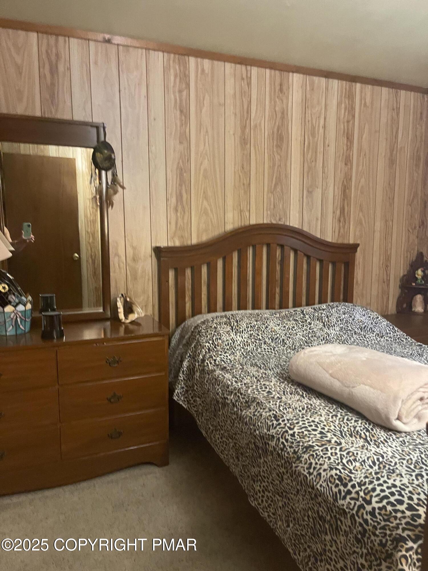 2112 Eagle Path Bushkill, PA 18324 - Photo 6 of 14 a bed sitting in a bedroom next to a window