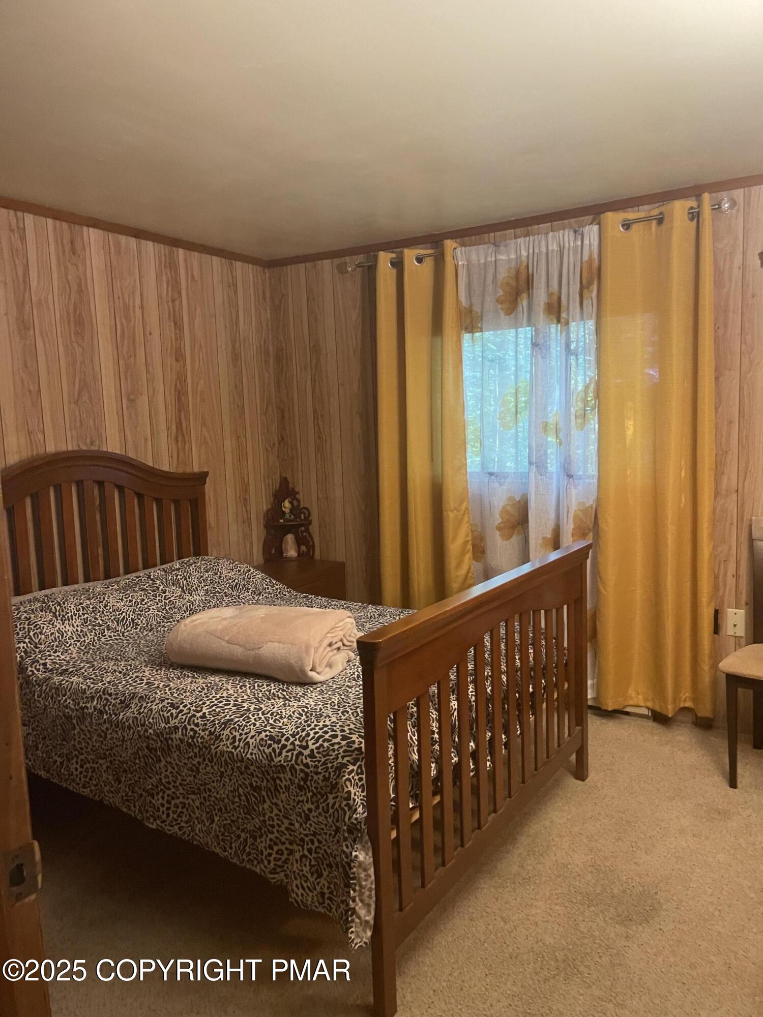 2112 Eagle Path Bushkill, PA 18324 - Photo 7 of 14 a bedroom with a bed and a window