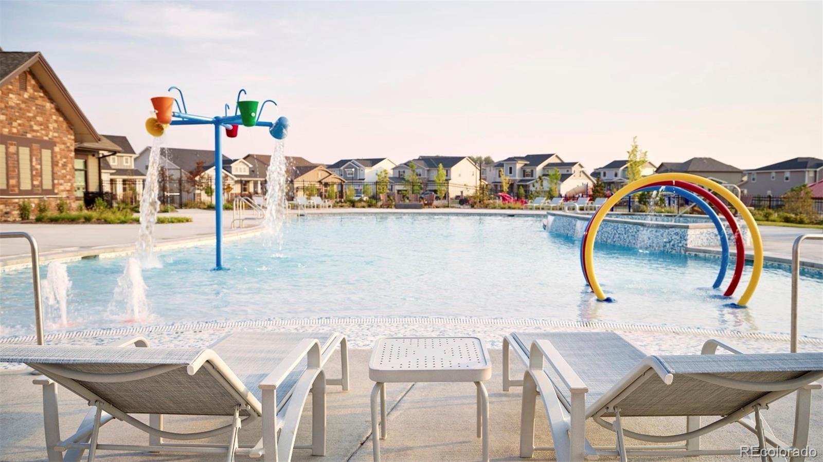 14163 Kearney Loop Thornton, CO 80602 - Photo 34 of 35 a view of swimming pool with outdoor seating