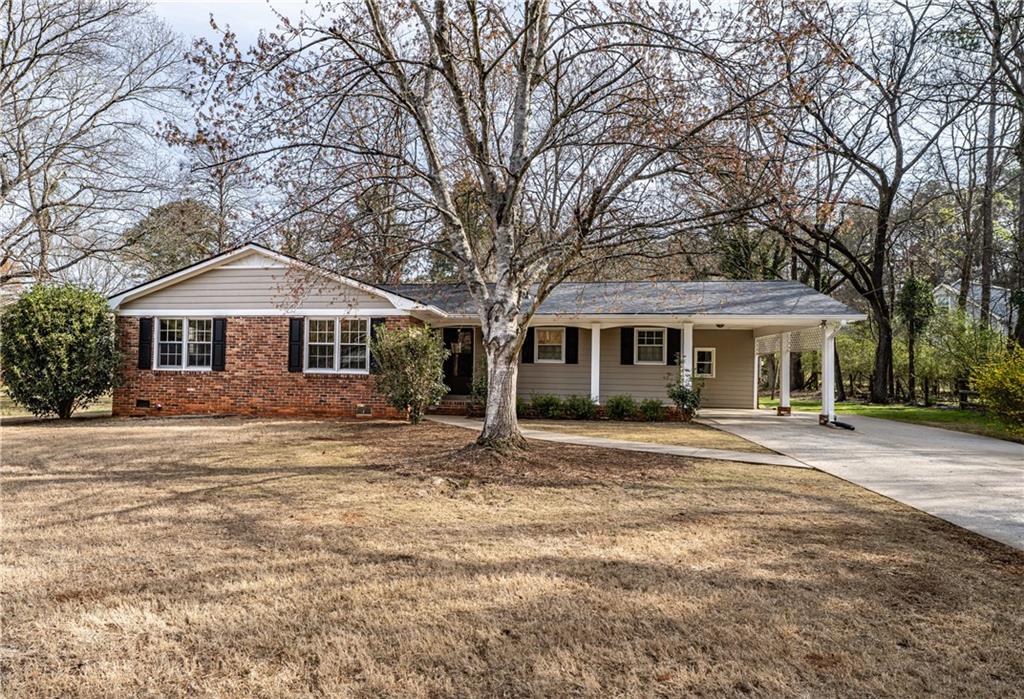 3 Bray Road Southeast Rome, GA 30161 - Photo 1 of 1 a front view of a house with a garden