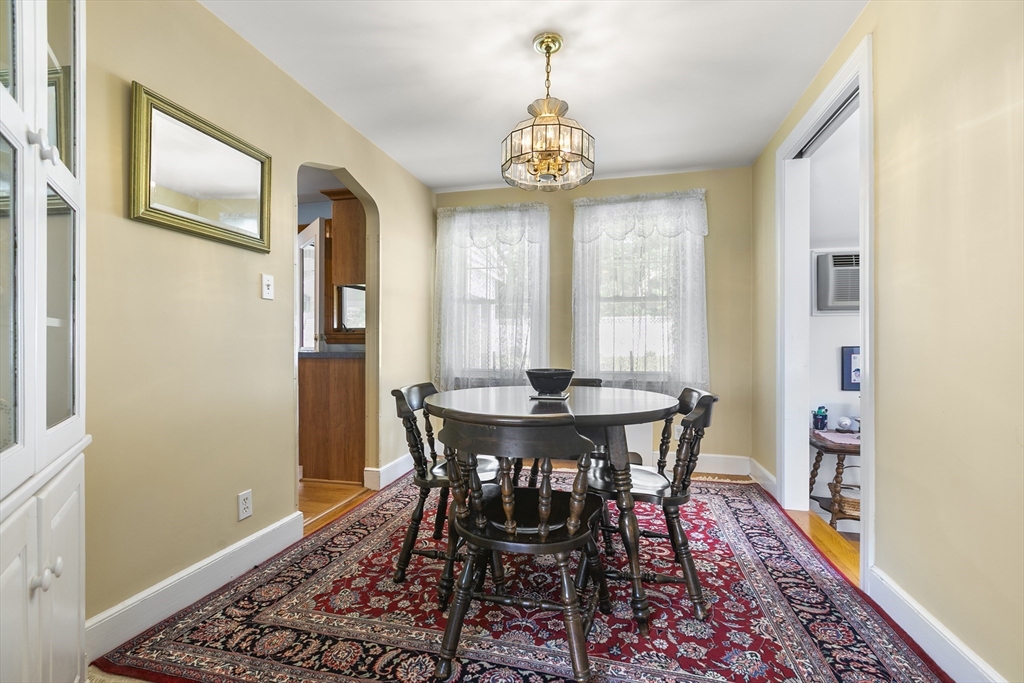 43 Long Meadow Road Arlington, MA 02474 - Photo 6 of 42 a view of a dining room with furniture window and wooden floor