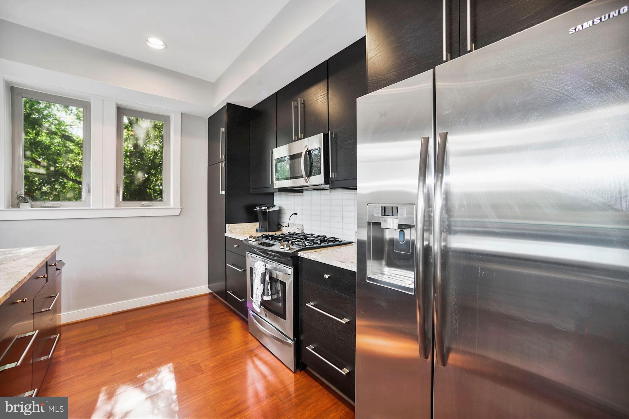 241 R Street Northeast, Unit B Washington, DC 20002 - Photo 13 of 31 Kitchen has Natural Lighting