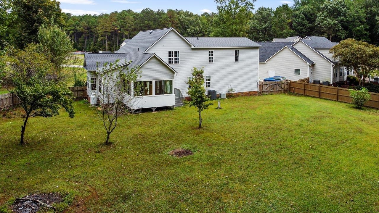 362 Cattle Farm Drive Raleigh, NC 27603 - Photo 28 of 30 Plenty of room for a pool and shed and more. .75 acre fenced yard.