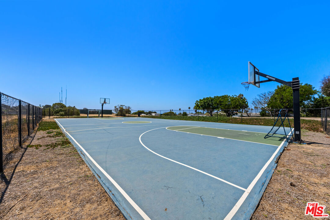 29500 Heathercliff Road, Unit 173 Malibu, CA 90265 - Photo 26 of 27 a view of a tennis court