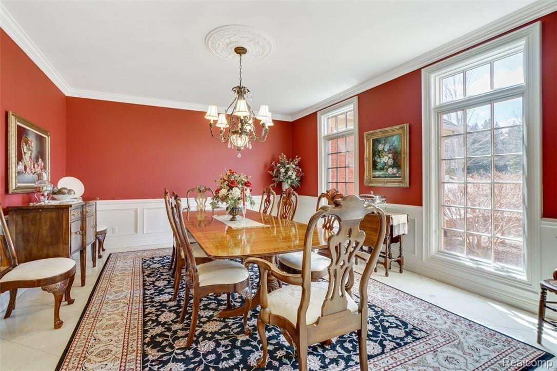 4657 Fawn Hill Court Rochester, MI 48306 - Photo 27 of 79 The Formal Dining Room has Marble Floor and Beautiful Wainscoting and Windows.