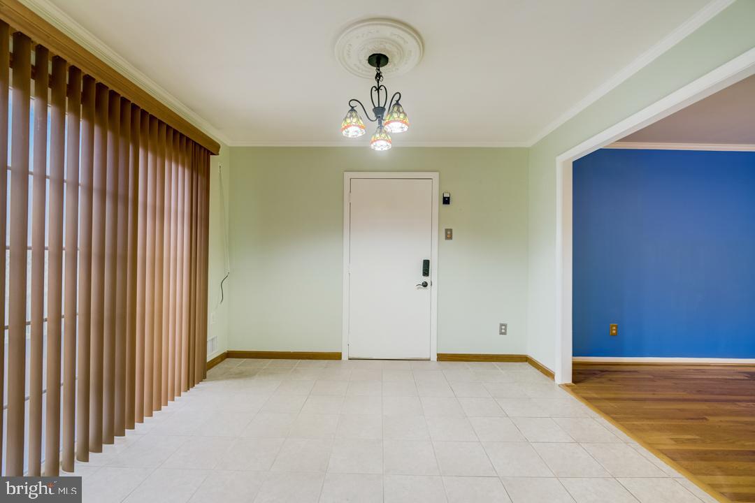 7215 Willow Oak Place Springfield, VA 22153 - Photo 17 of 30 a view of an empty room with a window