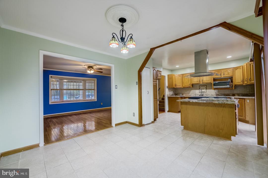 7215 Willow Oak Place Springfield, VA 22153 - Photo 18 of 30 a view of a kitchen with a sink and refrigerator