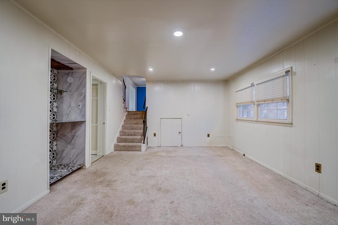 7215 Willow Oak Place Springfield, VA 22153 - Photo 20 of 30 a view of entryway with stairs and a window