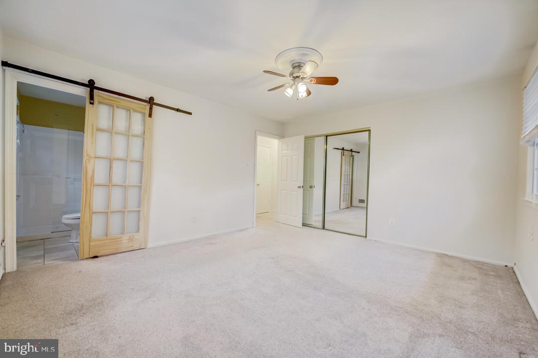 7215 Willow Oak Place Springfield, VA 22153 - Photo 28 of 30 a view of an empty room with a window