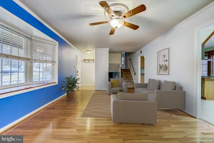 7215 Willow Oak Place Springfield, VA 22153 - Photo 3 of 30 a living room with furniture and a large window