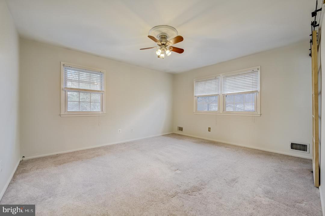 7215 Willow Oak Place Springfield, VA 22153 - Photo 8 of 30 an empty room with a window