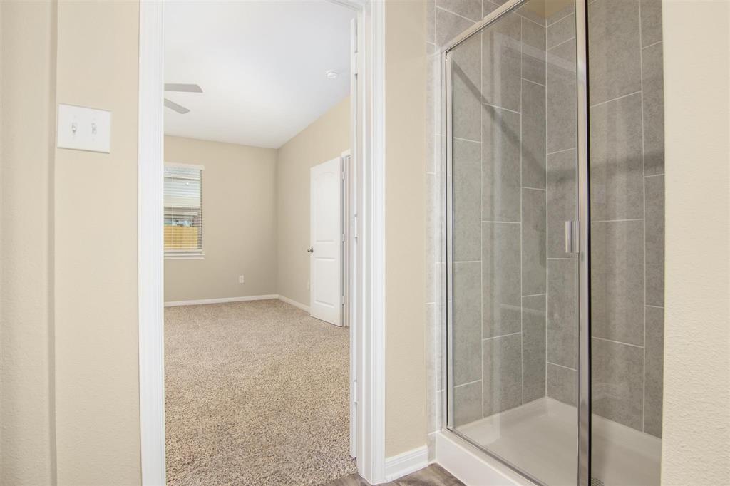 248 Enchanted Way Princeton, TX 75407 - Photo 14 of 24 a view of an empty room