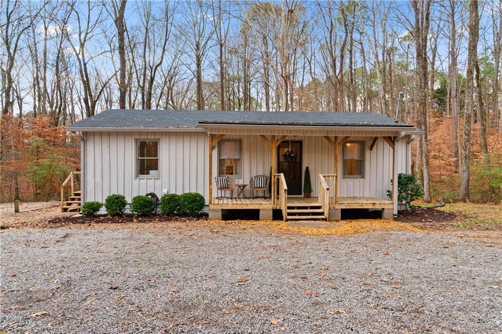 316 Evans Cook Road Canton, GA 30115 - Photo 1 of 1 a front view of a house with garden