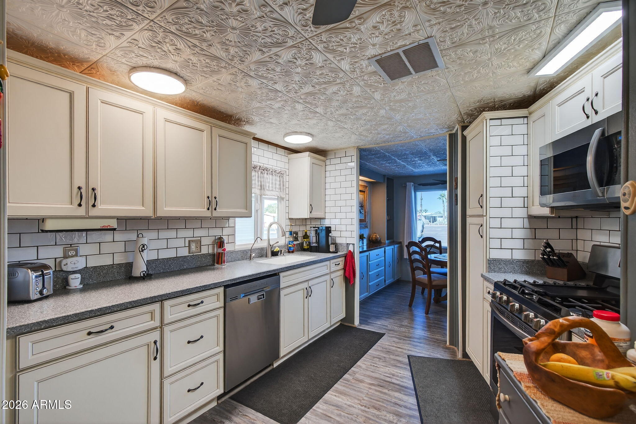 2100 North Trekell Road, Unit 196 Casa Grande, AZ 85122 - Photo 12 of 40 a kitchen with a sink appliances cabinets and a counter top space